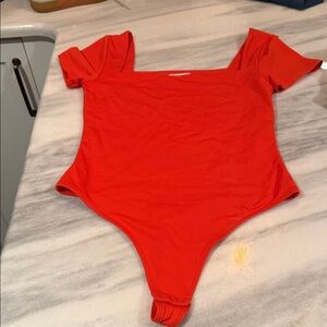 Aritzia Contour Bodysuit in Vibrant Orange